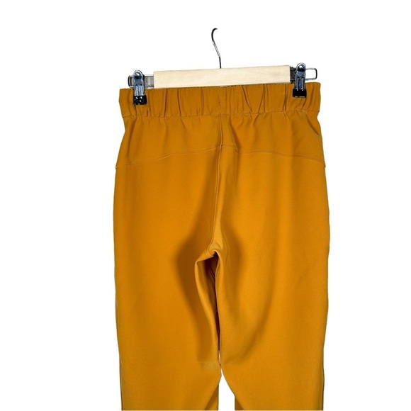 LULULEMON On the Fly 7/8 Woven Pant 27” in Fools Gold - Picture 10 of 13